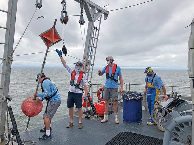 scientists onboard research vessel